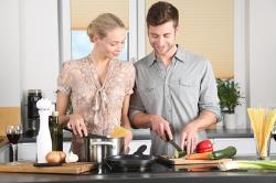 Phoenix couple prepping dinner on their LG cooktop