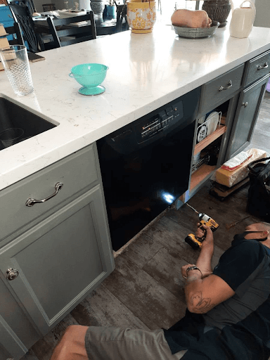 Peoria dishwasher service experts at work.